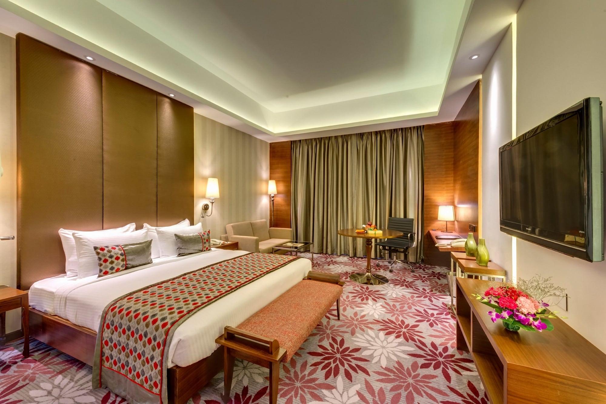 Pride Plaza Hotel, Calcutta Extérieur photo Deluxe Room