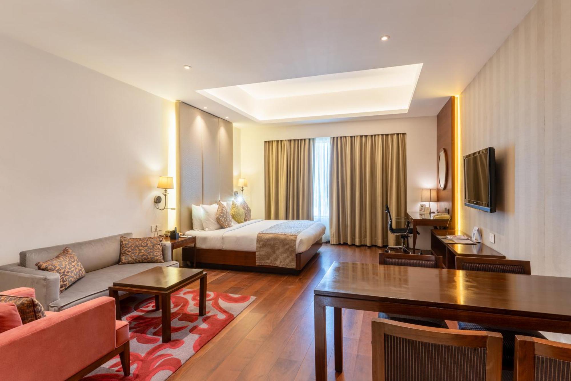 Pride Plaza Hotel, Calcutta Extérieur photo A room at the hotel